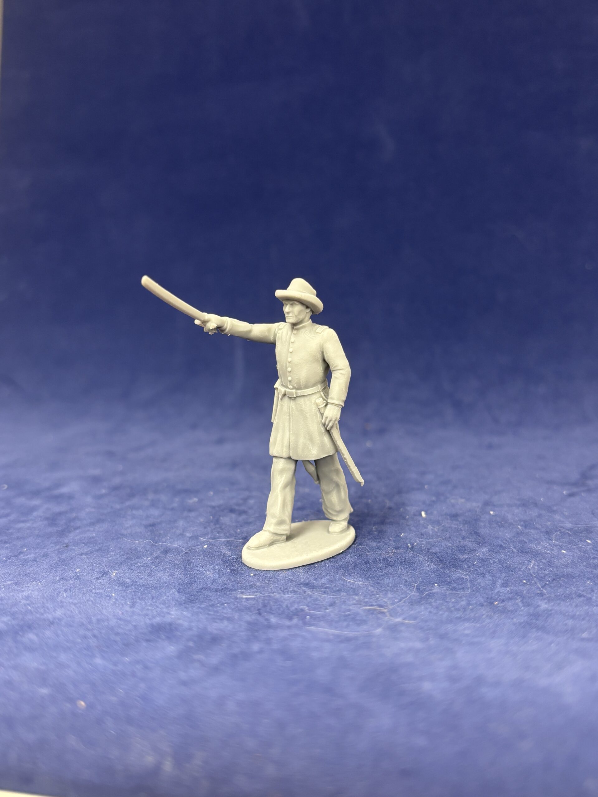 Confederate officer advancing with sword raised high