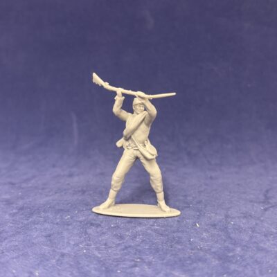 Confederate soldier in kepi attacks enemy
