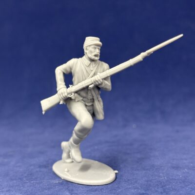Soldier charging in short jacket and Kepi beard