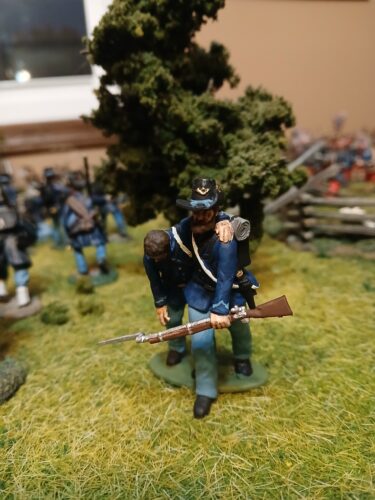 Soldier assisting wounded hardee hat and beard photo review