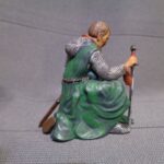 Medieval bishop kneeling and praying - NCM photo review