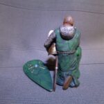 Medieval bishop kneeling and praying - NCM photo review