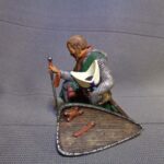 Medieval bishop kneeling and praying - NCM photo review