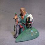 Medieval bishop kneeling and praying - NCM photo review