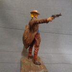 Revolver man with long coat photo review