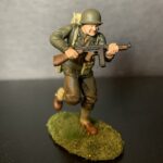 American WW2 GI soldier running with Thompson Gun in hand. photo review