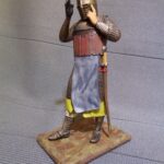 Medieval knight taking on helmet - NCM photo review
