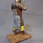 Medieval knight taking on helmet - NCM photo review