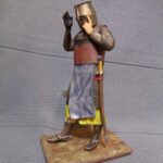 Medieval knight taking on helmet - NCM photo review