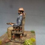 Hard boiled cowboy in rocking chair photo review