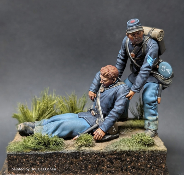 Union soldier helping wounded fellow