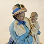 Woman with baby on arm photo review