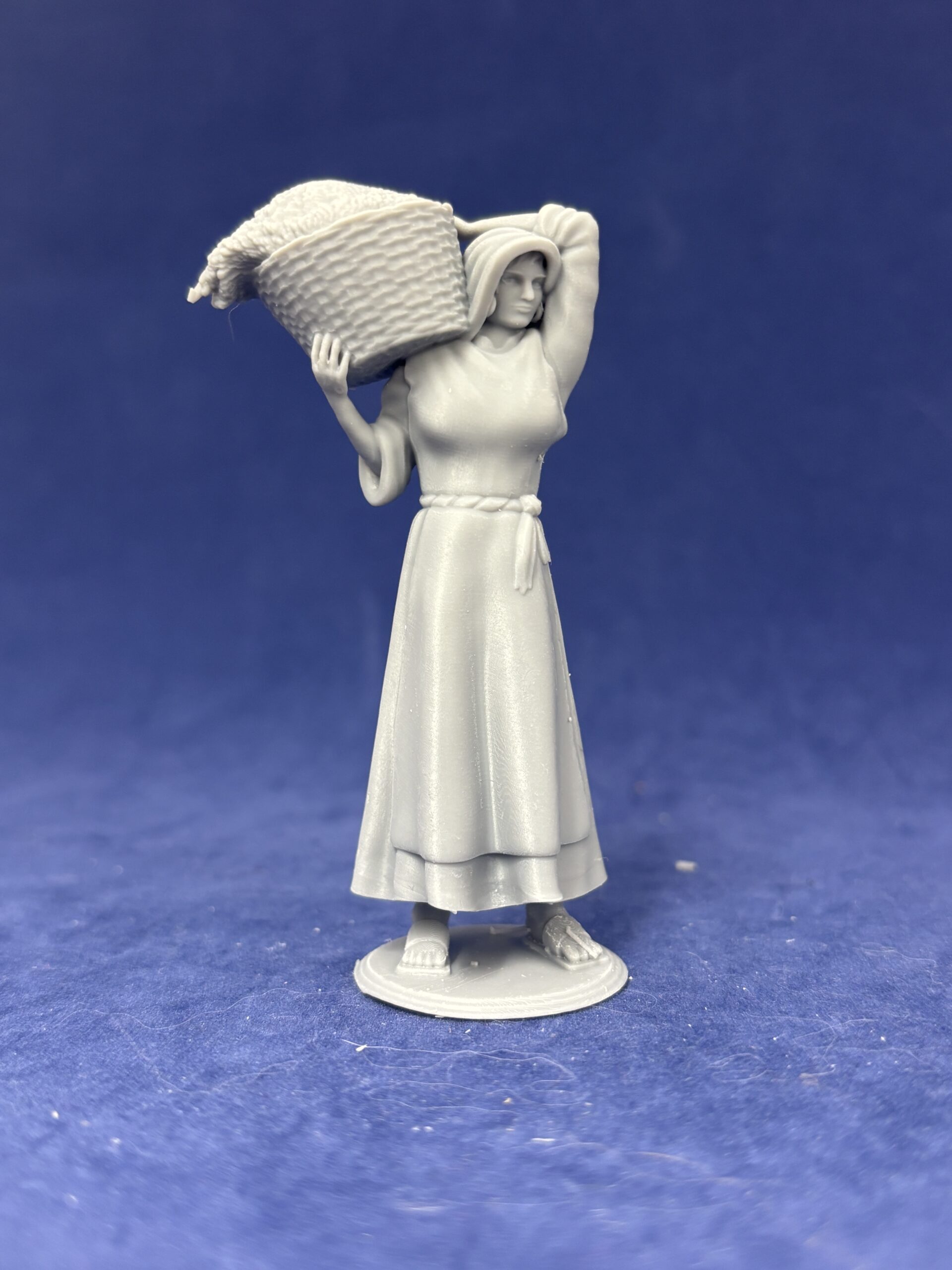 Ancient woman carrying wheat in basket