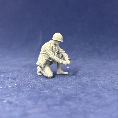 American GI medic crouching
