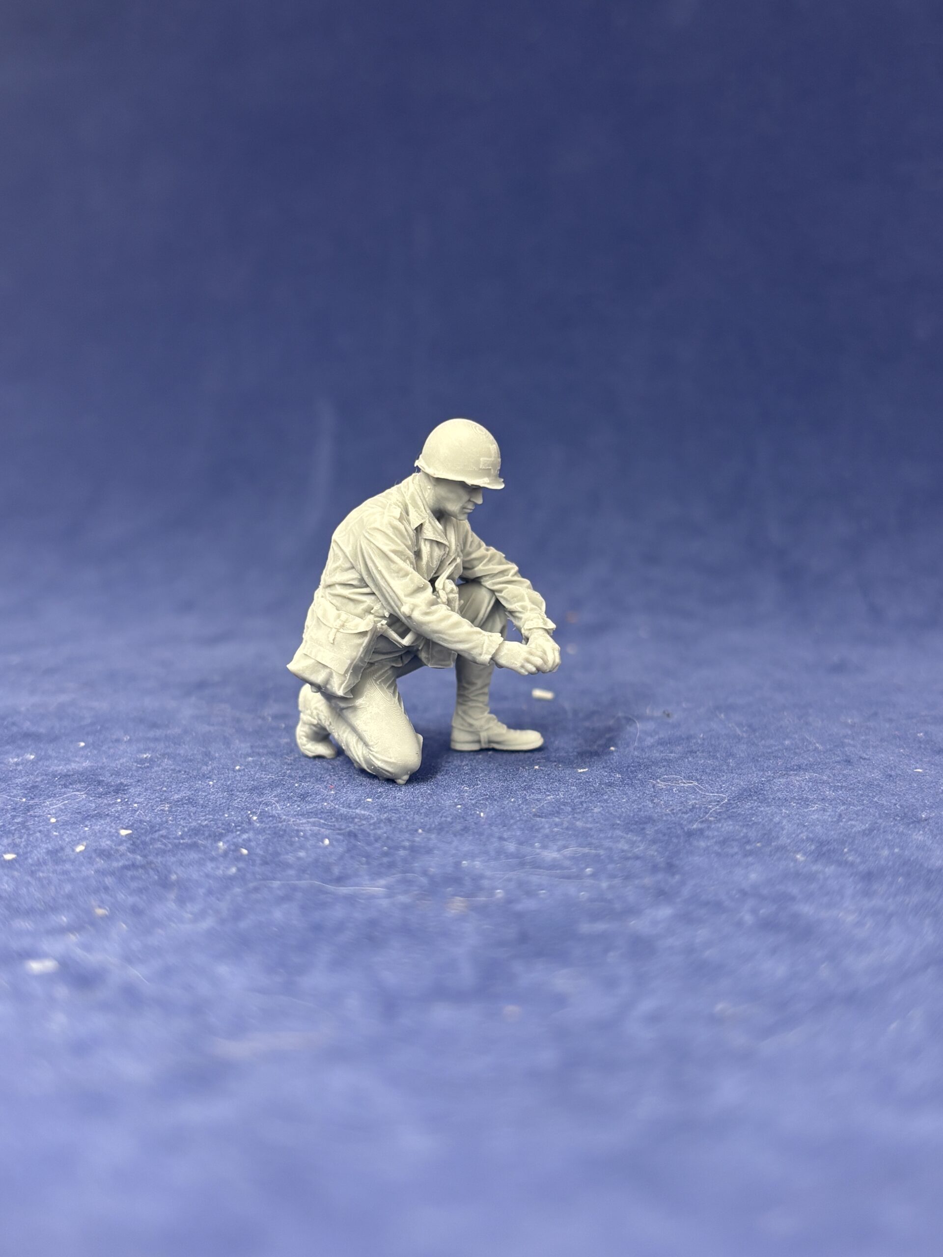 American GI medic crouching