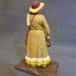 Western Lady with teapot, wind blowing photo review