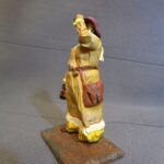 Western Lady with teapot, wind blowing photo review