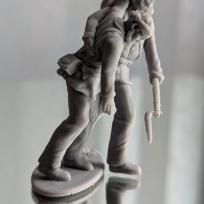 Soldier assisting wounded friend, Hardee Hat