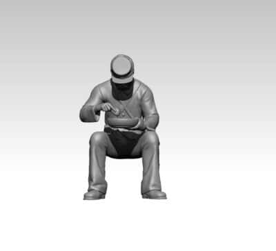 Union soldier sitting eating a meal
