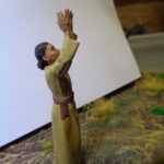 Medieval woman cheering on photo review