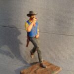 Cowboy leaning wall photo review
