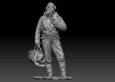 British WW2 pilot in gear standing with bag