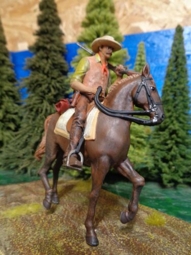 Click to view full screen Wild West Cowboy Rider rifle over shoulder photo review