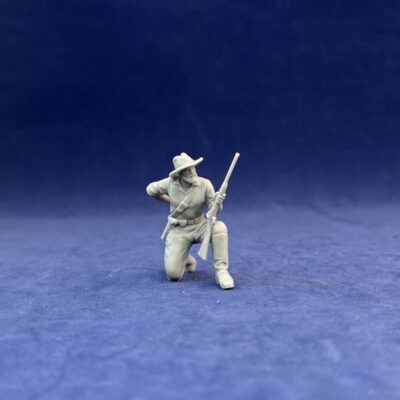Dismounted 7th Cavalry, kneeling loading carbine
