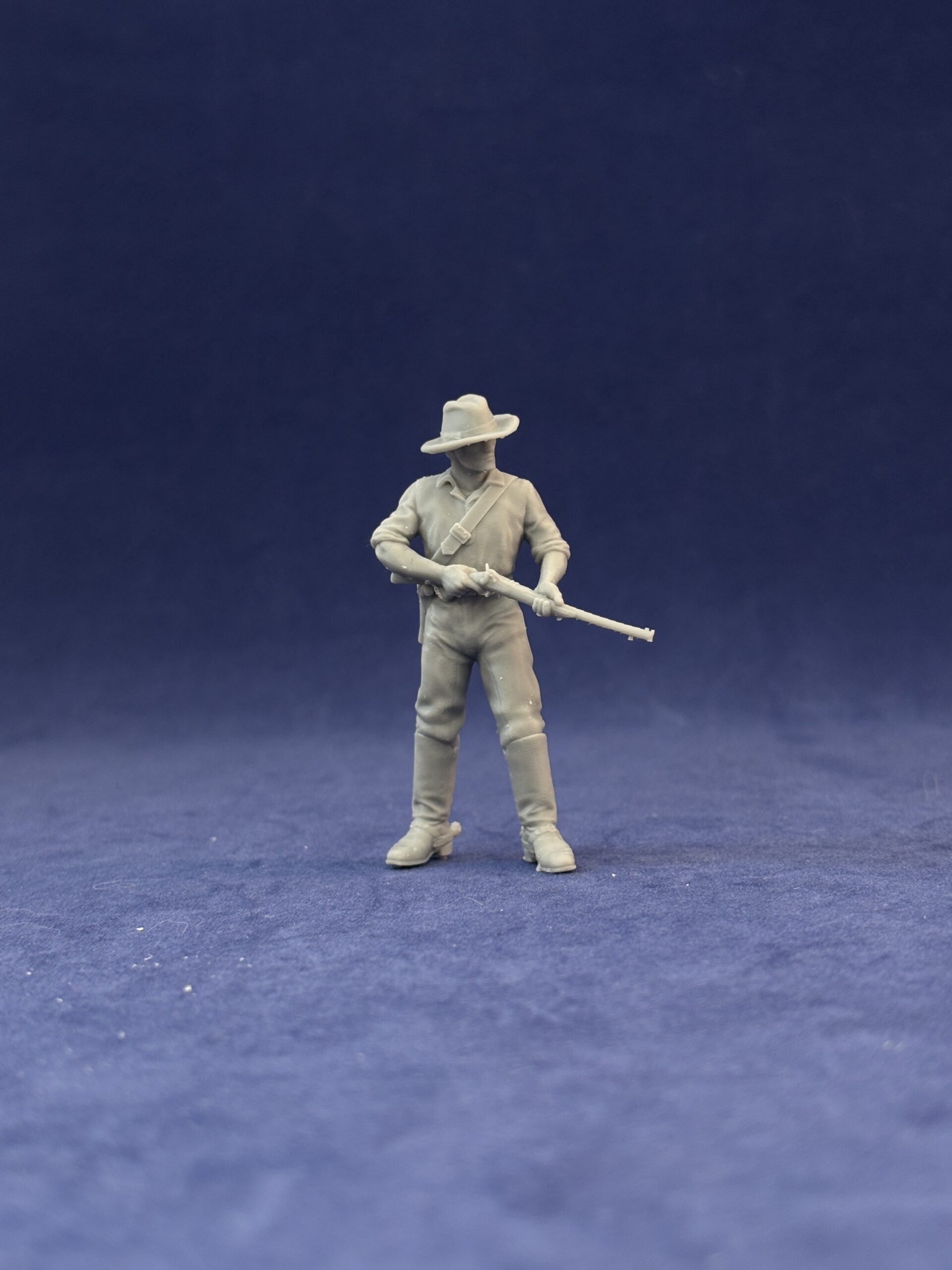 Dismounted 7th Cavalry standing with carbine at the ready