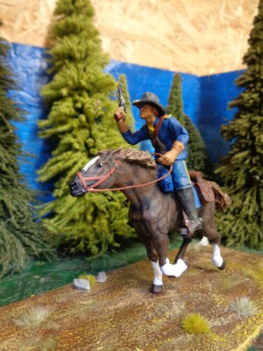 Click to view full screen Crouched rider gun up photo review