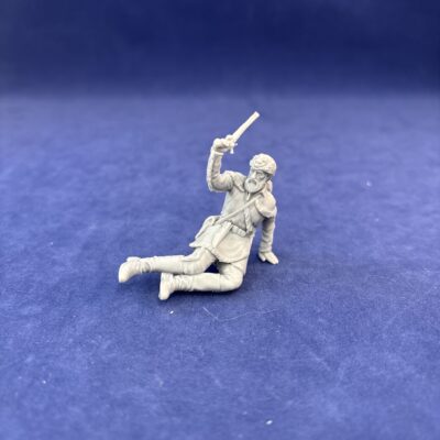 Alamo Trapper on ground with pistol