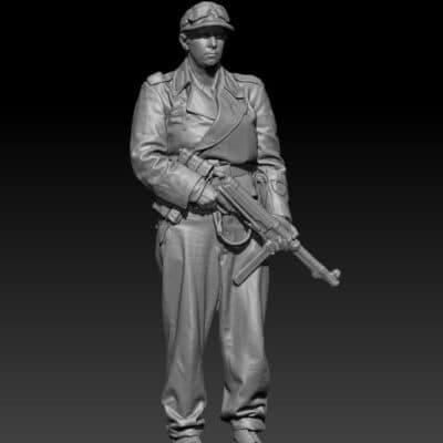 German WW2 soldier in cap standing guard with MP40