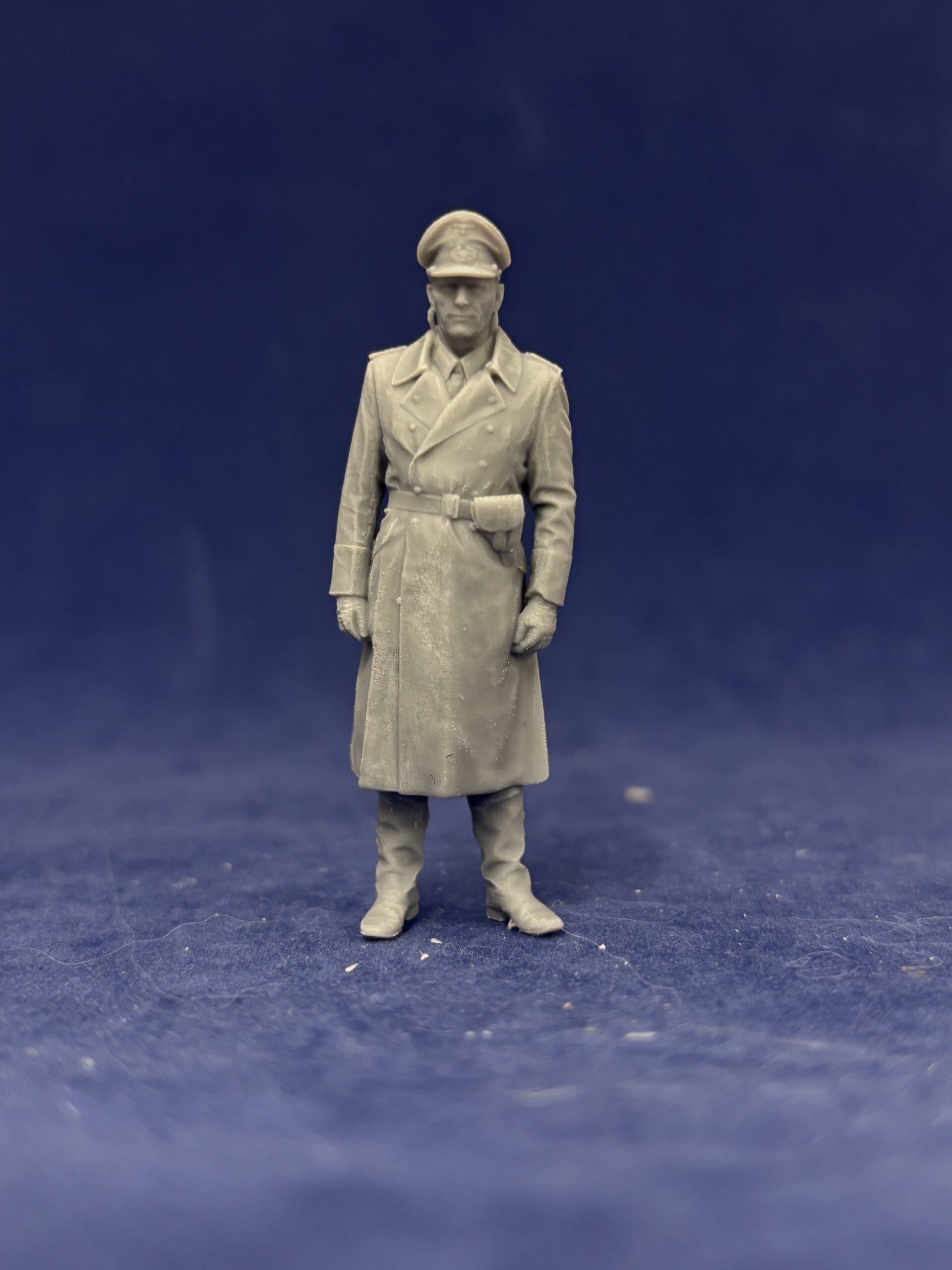 German Officer in long coat, waiting
