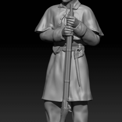 Winter Union soldier in greatcoat standing holding rifle