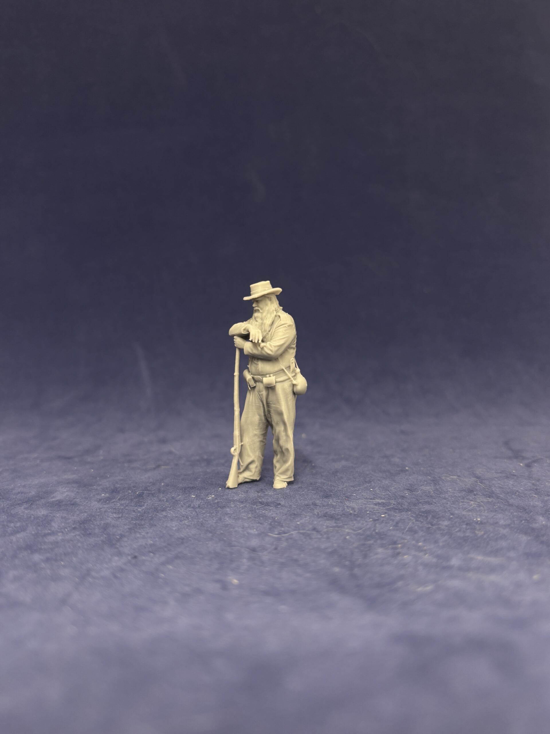 Confederate Civil war soldier leaning on rifle