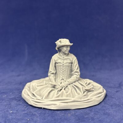 Victorian Lady in Fashionable Day Dress sitting down in the Grass - 1860s