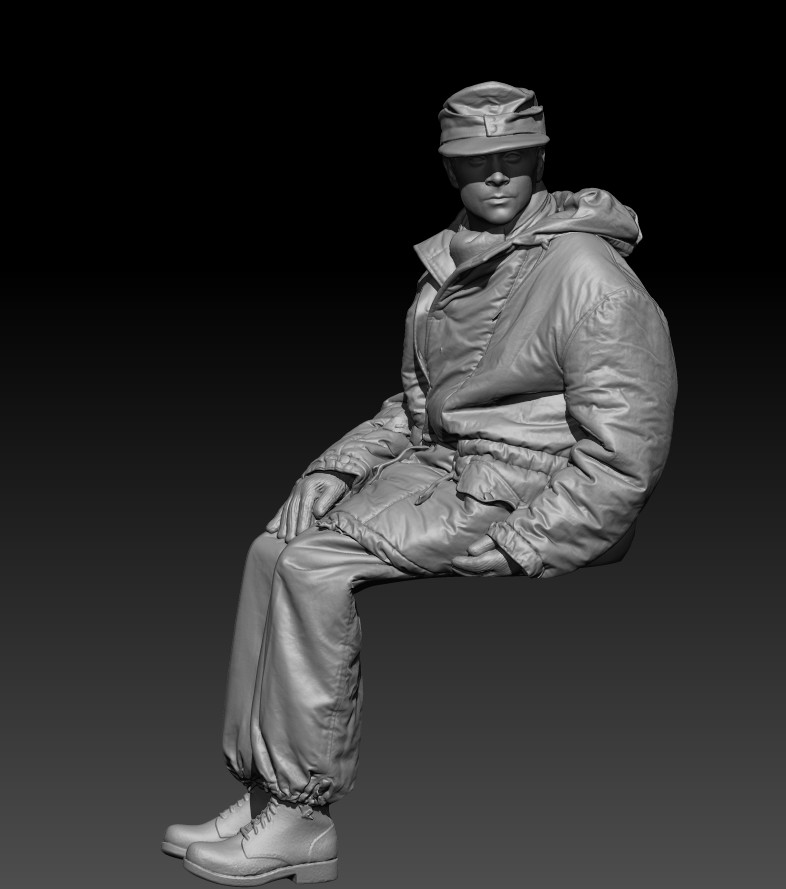German winter soldier sitting, possibly on tank